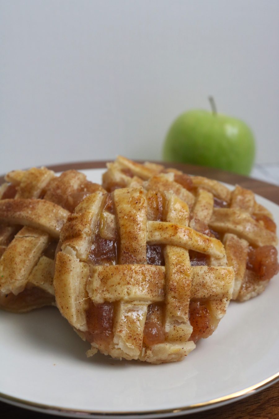 These caramel apple pie cookies are soft, gooey, and loaded with cinnamon apples + rich caramel drizzle. The perfect mix of cozy and indulgent, they taste just like a caramel apple in cookie form. Easy, crowd-pleasing, and SO good!